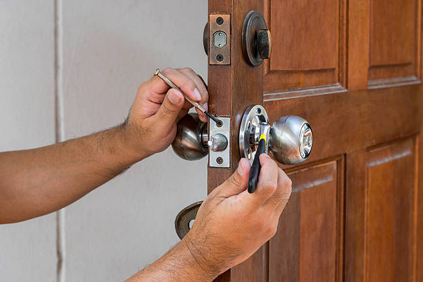 wood door and locksmith maintain silver knob